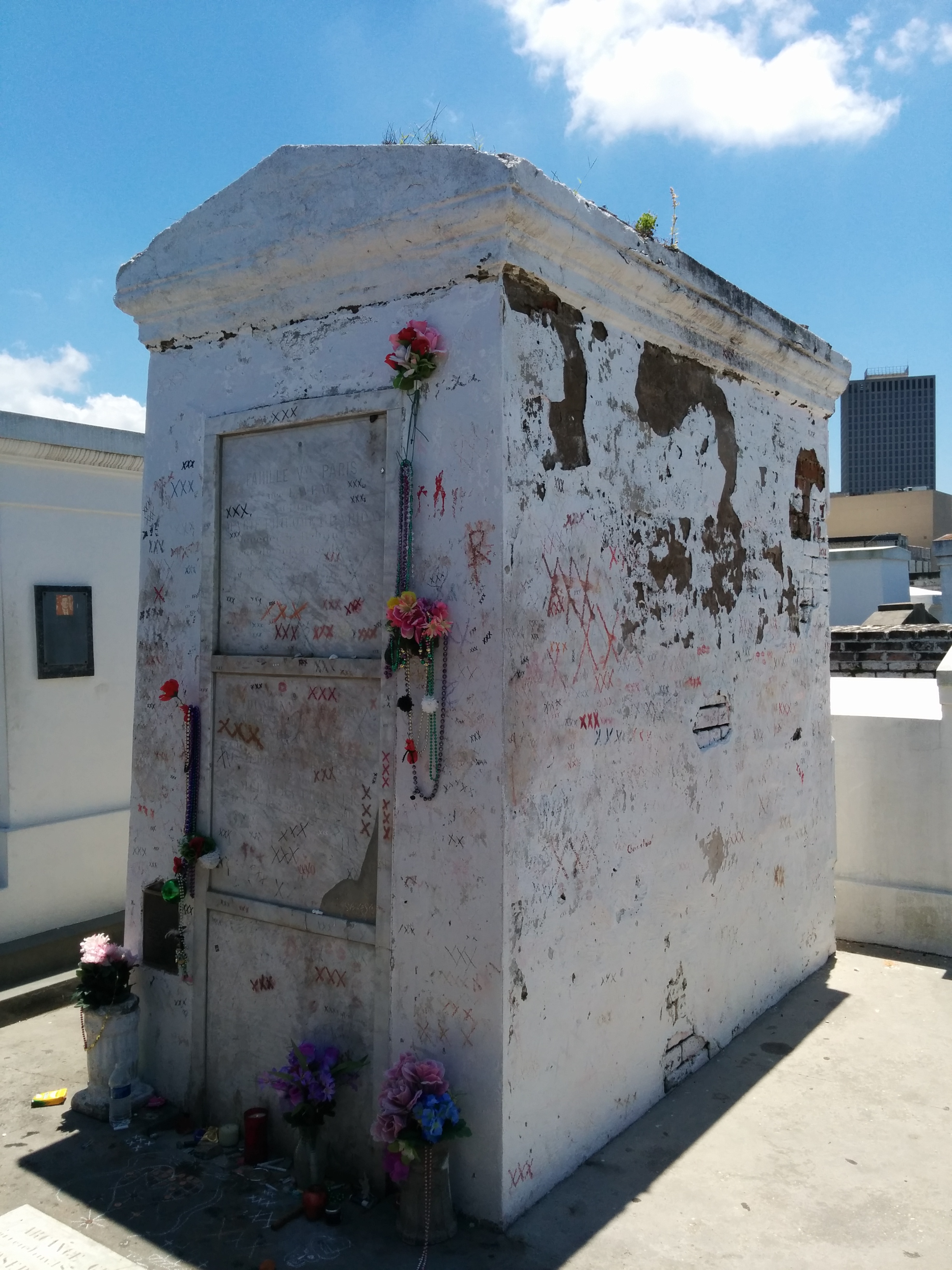 Marie Laveau's tomb, complete with offerings. 