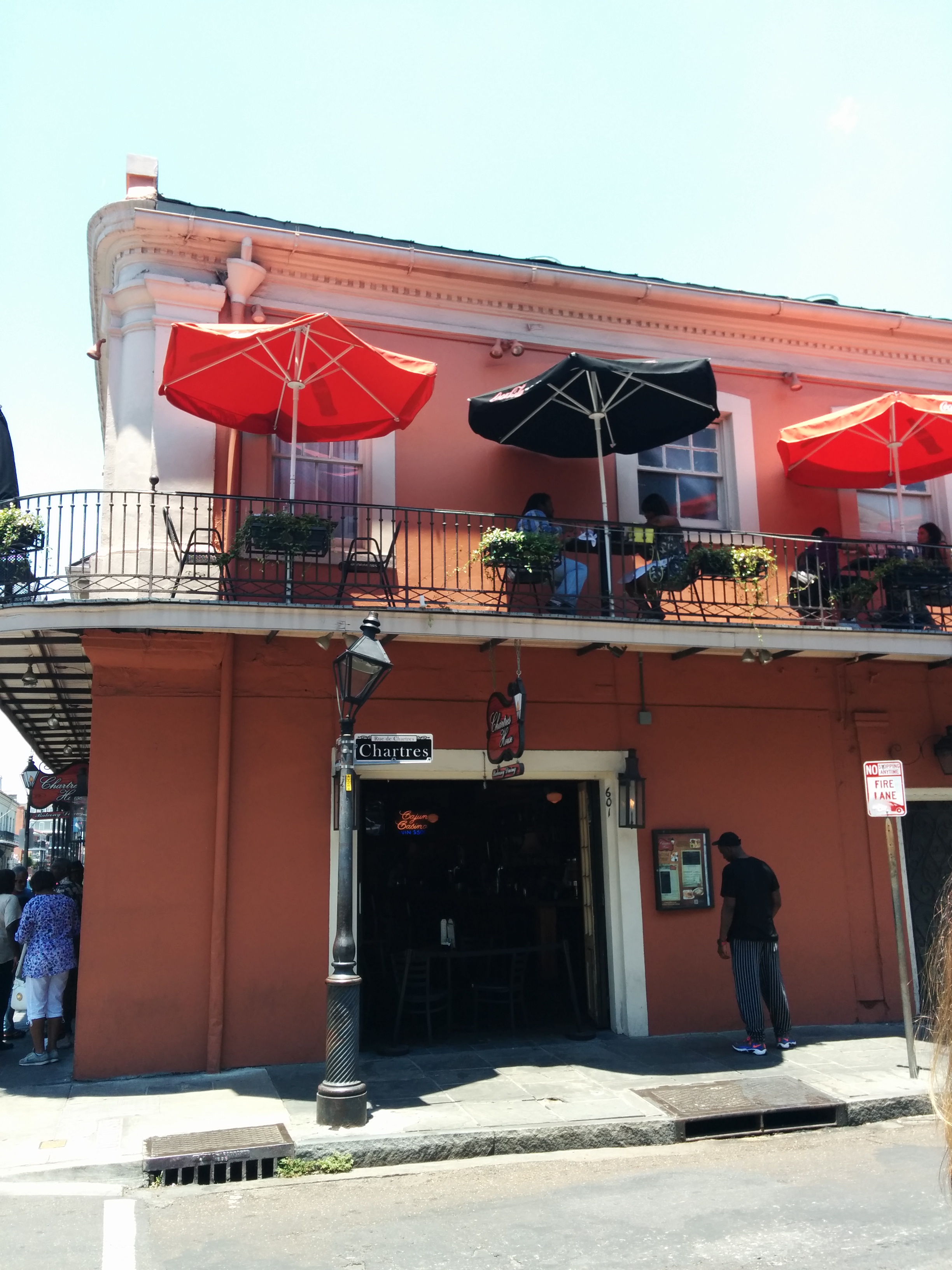 Balconies don't have support poles. Terraces do. Everyone hangs out on them regardless.